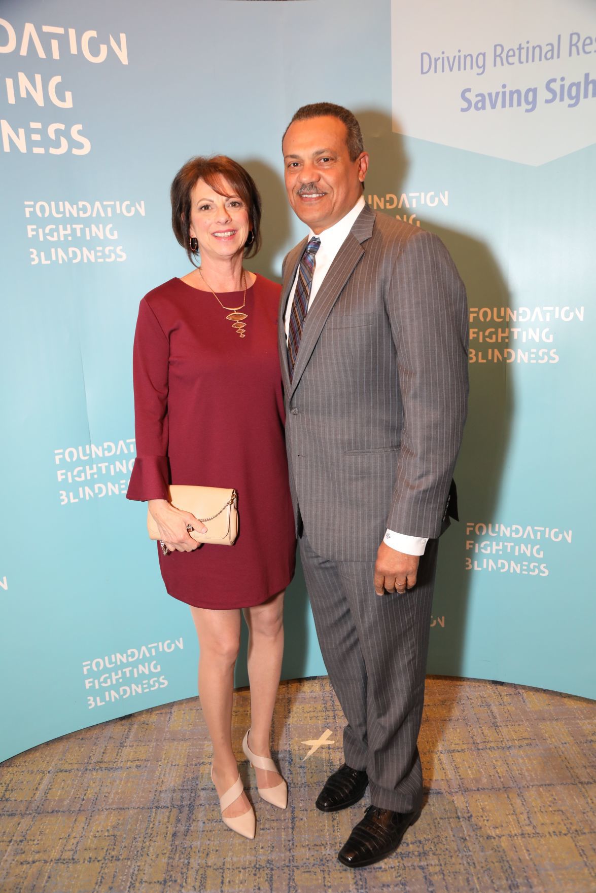 Melissa Mark, Visionary Award honoree Richard J. Mark, Chairman and President of Ameren Illinois